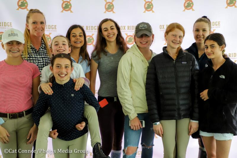 Assistant Trainer Cori Reich with students of the Ox Ridge Riding and Racquet Club